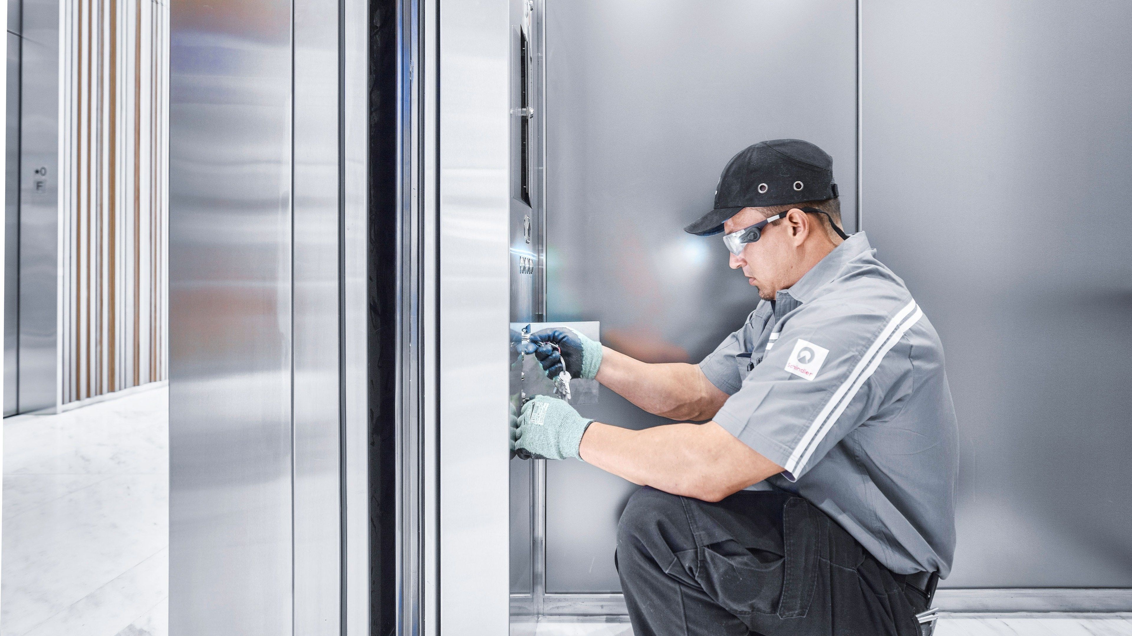 A Schindler technician servicing an elevator