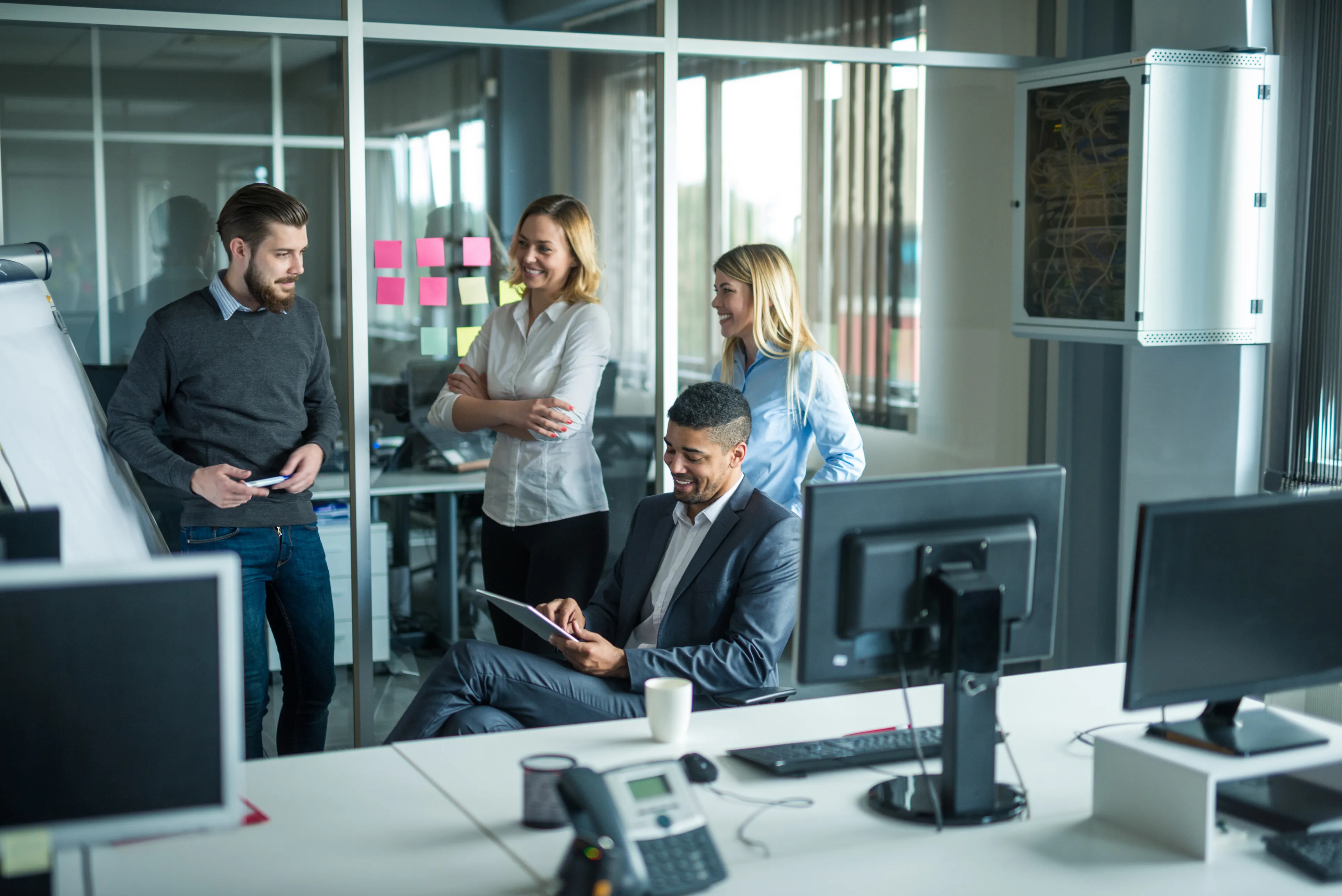 A team talking through work in an office