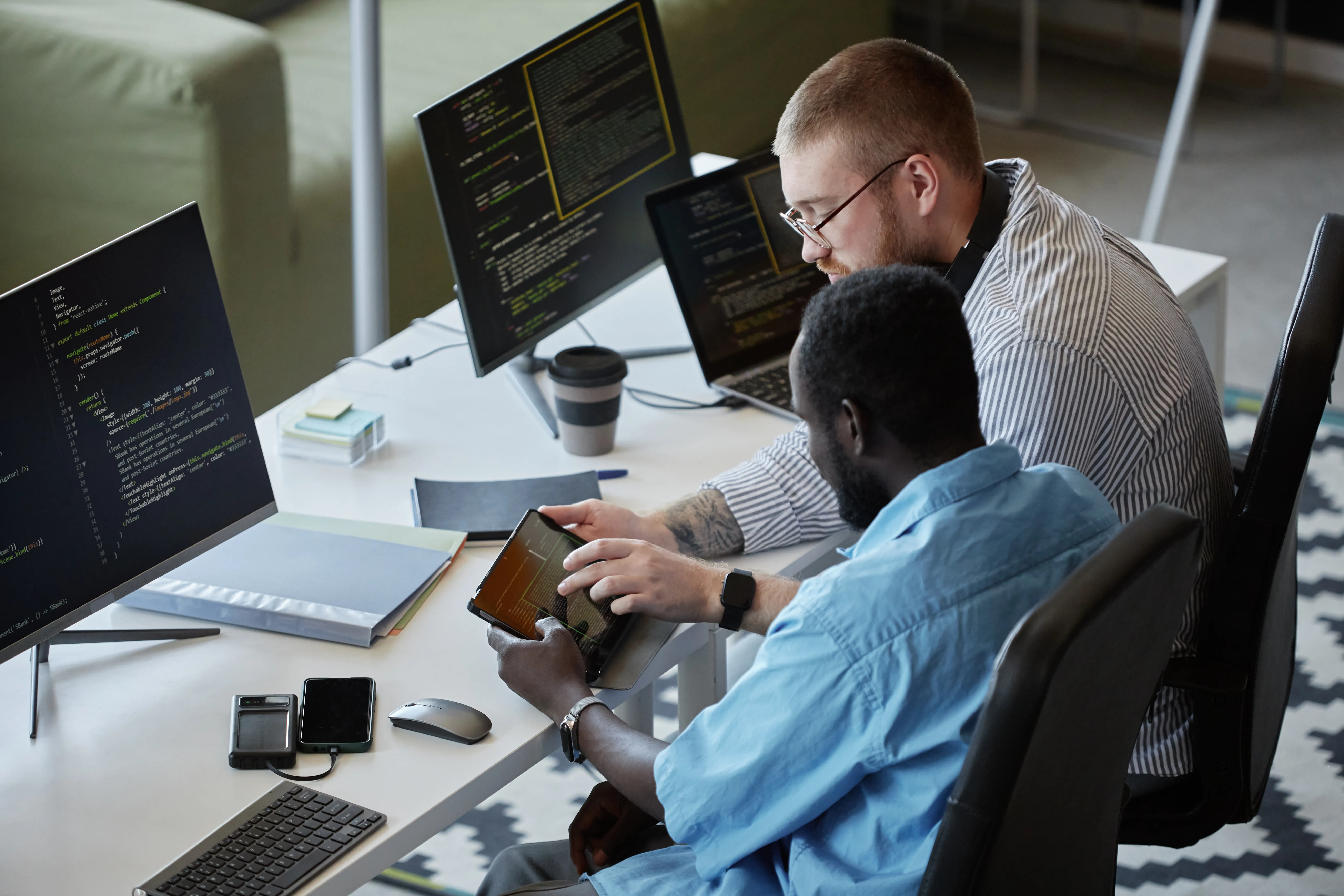 Two developers working through code together