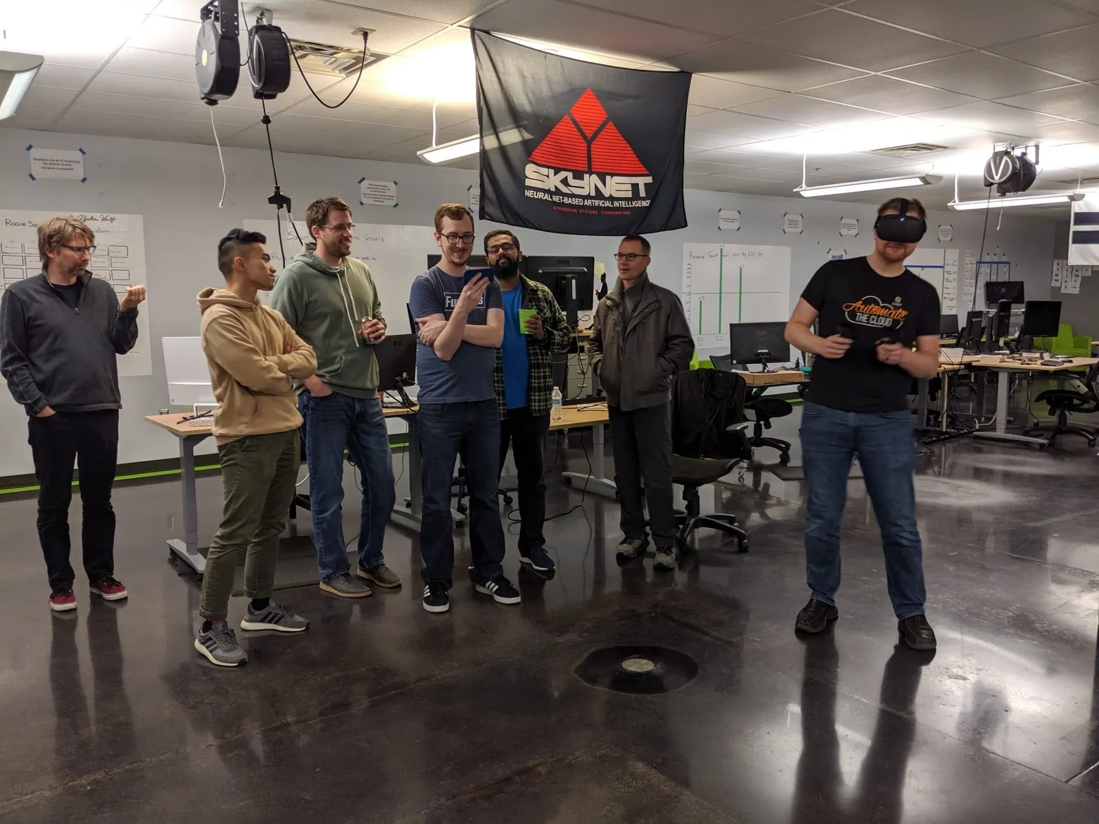 Team members trying virtual reality in the office