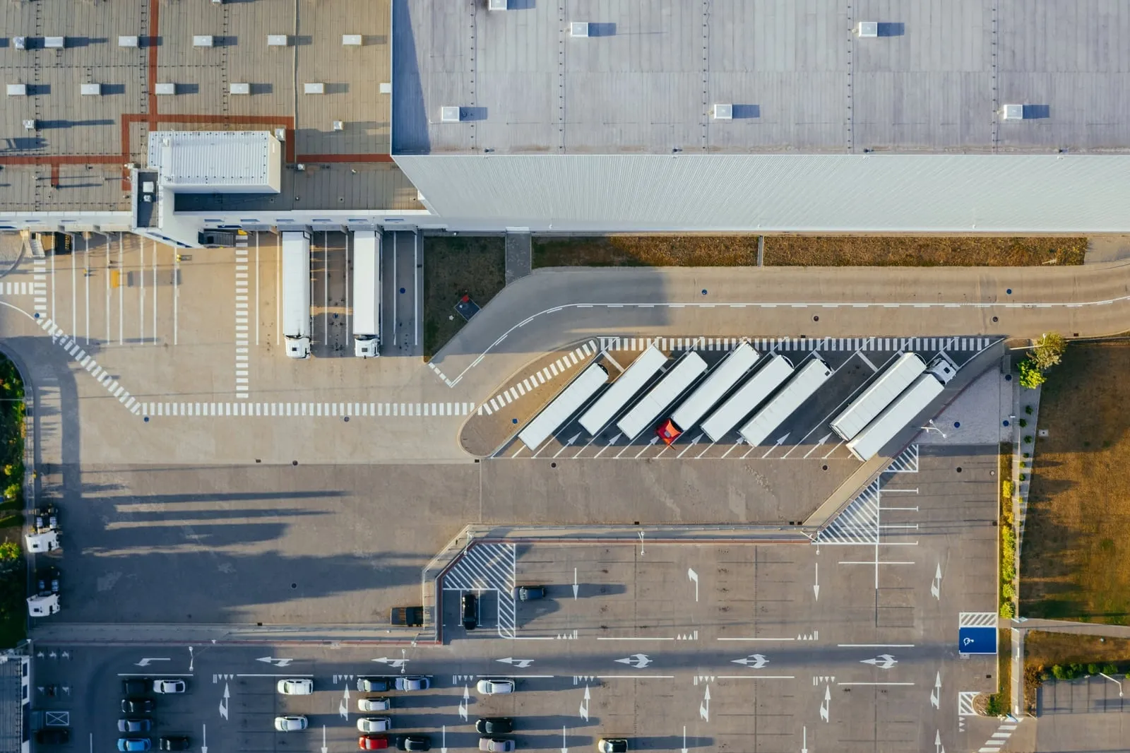 An aerial view of a distribution center and its truck yard