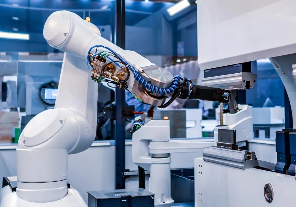 A robotic arm working in an automated production cell