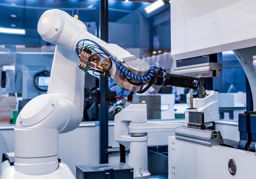 A robotic arm working in an automated production cell